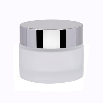 China Personal Care OEM Customization Personal Skin Care Stylish Logo Printing Round Cream Glass Jar 50ml for sale