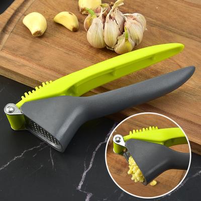 China Best Viable Top Selling Easy Clean Handled Manual Kitchen Chopper Stainless Steel Garlic Press for sale