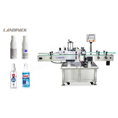 China Landpack LFT-LG-100 full automatic food for round bottle positioning and plastic labeling machine for sale