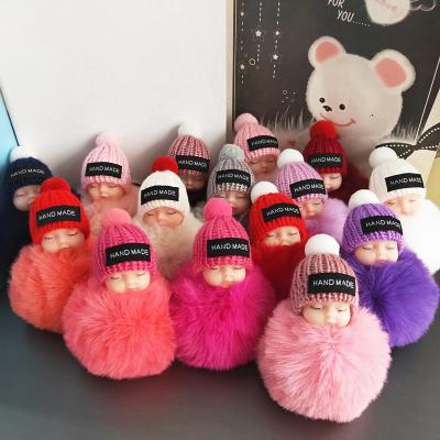 China Key chain sales simulation doll handbag doll kawaii sleep keychain fur pom pom pendant fuzzy cute unisex warm ball for sale