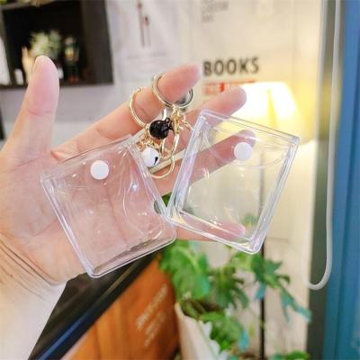 China NEW ARRIVAL PVC key chain transparent storage bag gloss lip earphone holder key bag doll place promotion gift for sale