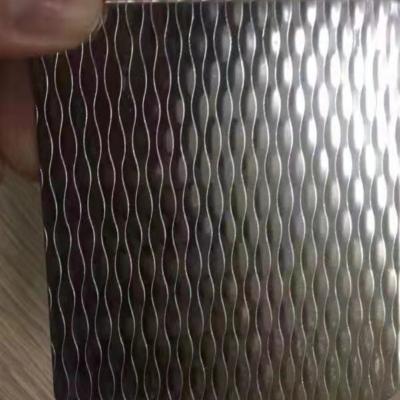 China SUS304 4X8 FT Stamped Colored  Rice Grain Shape Decorative Stamped Stainless Steel Sheet for sale