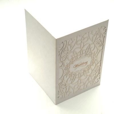 China Wedding decoration & Luxury Gift Wholesale Laser Cut Ribbon Glitter Pearl Paper Wedding Invitations With Gold Foil Stamping Logo for sale