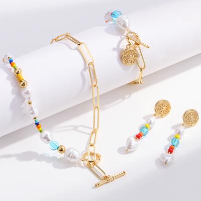 China 2022 Spring Summer Paper Clip Chain Bead Necklace Drop Earring Bracelet Set Dangling Seed Paper Clip Beads Gold Jewelry Pendant Set for sale