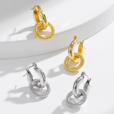 China 2022 FASHIONABLE KJ gold and silver hollow spiral earrings for European and American design retro cool universal earrings for sale