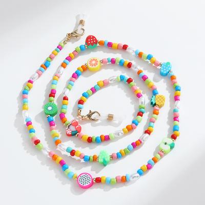 China 2022 Women Multi Function BOHEMIA Boho Seed Beads Anti-lose Beads Colorful Fruit Charms Earphone Sunglasses Tie Rope Glass Chain for sale