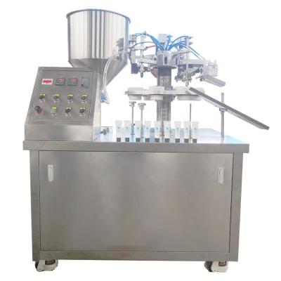 China Semi automatic food paste cream parplastic laminated tube filling sealing machine with inner heater and outer heater for sale