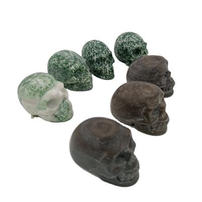 China China Wholesale Natural Crystal Skulls Hand Carved Mini Skulls Natural Stone Green Jade Skulls Decoration for sale