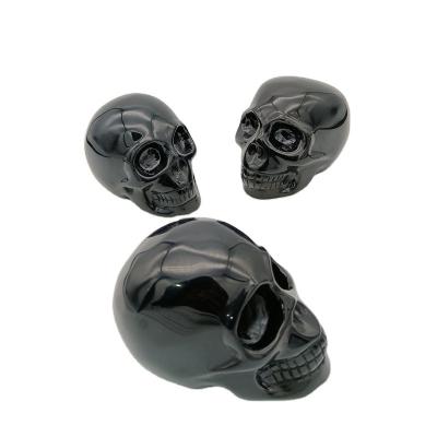 China Wholesale Natural Black Obsidian Crystal Skulls Large Skulls From China for sale