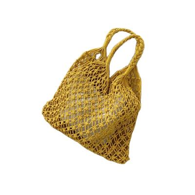 China Tiktok 2022 Han's Edition PORTABLE Rural Straw Bales Wind Female Hollow Out Bucket Bag Large Capacity One Shoulder Bag for sale