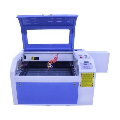 China Laser Engraving Cheap 60W 80W 100W 130W CO2 Laser Stone Wood Mini Laser Granite Acrylic Engraving Machine for sale