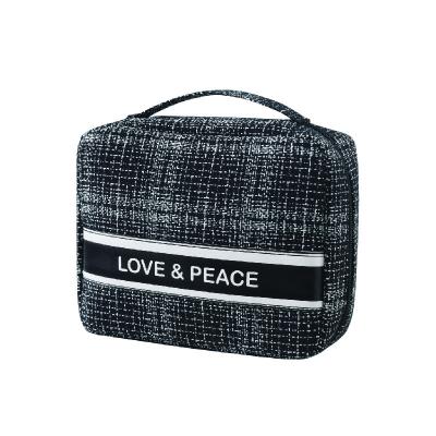 China 2021 Fashion Multi Pocket & Space To Storage LOVE&PEACE Letter Printing Square Makeup Bag Cosmetic Case With Handle for sale