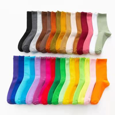 China Sporty new rainbow colored nk socks crocsnsocks high quality unisex candy brand tube jars breathable casual sports crew socks for sale