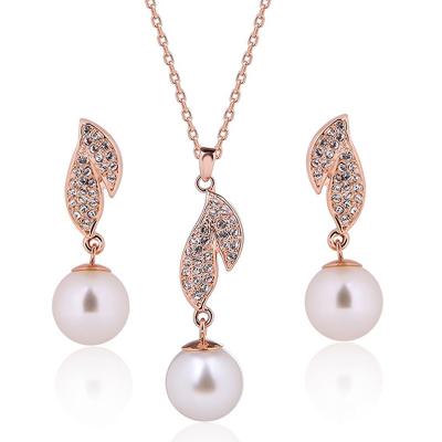 China YK Classic Europe and American Hot Sales Smart Pearl Earrings Necklace Set Rose Gold Leaf Jewelry Set for sale