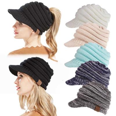 China Wholesale COMMON fashion winter women knitted hats high quality warm ponytail hats bun visor for sale