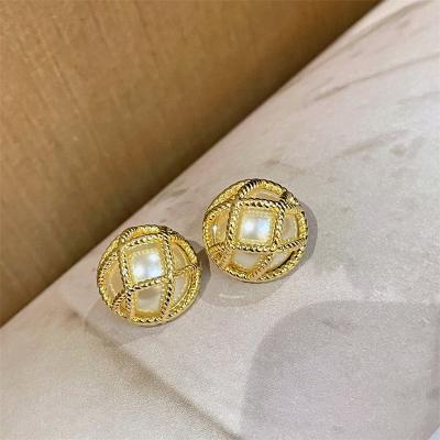 China GSOLD Hollow Metal Wrapped Pearl Stud Earrings French Style Gold Woven Jewelry Fashion Women Subscriber TRENDY Style Jewelry for sale