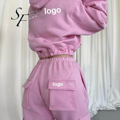 China Custom waterproof solid color casual trotter and hoodie crop top sweatshirts women tapered tracker 2 piece women clothes sweatsuit for sale