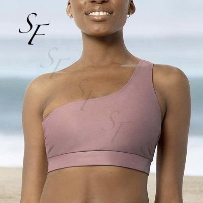 China Custom Shiny Breathable Crop Yoga Recyclable Workout Top One Shoulder Lift Up Sexy Women Yoga Sports Backless Bra for sale