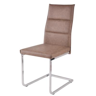 China Stable Luxury Modern Style PU Leather Covers Silver Bow Legs Dining Chair for sale