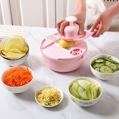 China Viable 12 in 1 Fruit and Vegetable Chopper Slicer Rotate Multifunctional Vegetable Cutter Kitchen Tools Vegetable Tools for sale