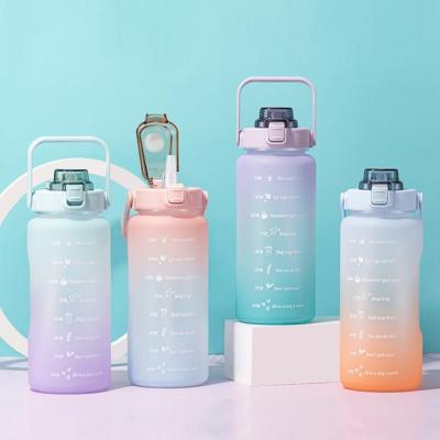 China Large Capacity Gradient Free Color Stocked 2L Sticker Plastic Water Bottles With Straw for sale