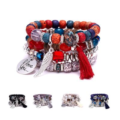 China Kupe TRENDY Trendy Statement Multilayer Tassel Wings Dangle Women Bohemia Ethnic Bead Bracelet Jewelry for sale