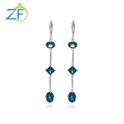 China Best Collection 925 Sterling Silver Natural London Blue Topaz Star Geometry Long Style Drop Earrings CLASSIC For Women for sale