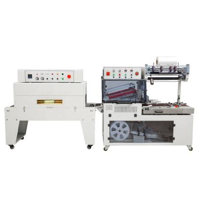 China Food Cover Film Heat Shrink Tunnel Wrapping Machine Shrink Cutting Machine On Sale for sale