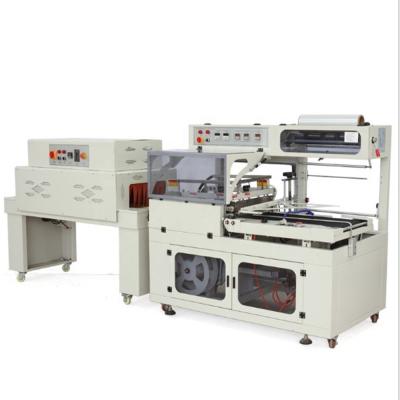 China Food Heat Tunnel Shrink Wrap Machine Side Sealing Cutting Machine for sale