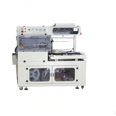 China FL-550 Food Plastic Wrap Machine Heat Shrink Shrink Film Packaging Machine for sale