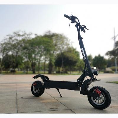 China 2021 MAIKE Warehouse Escooter 1200W Unisex Brushless Motor Electric Scooter 11 Inch Fat Tire Off Road Electric Scooter for sale