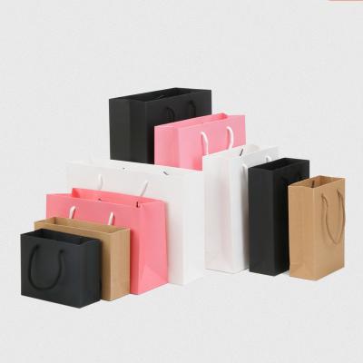 China Recycled Materials 250GSM 300GSM Printed Thick Kraft Bags Cardboard Paper Bag With Different Handle Accept Custom Logo Size Black Brown White Bags for sale