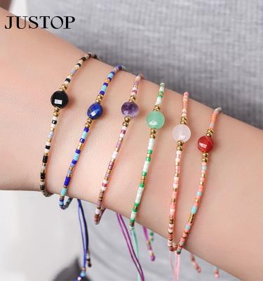 China Environmental Friendly Hot Selling Friendship For Boy And Girl Lucky Ball Handmade Rope Rainbow Color Seed Beads Charms Bracelet for sale