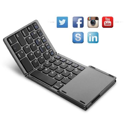 China BT 3.0 Mini Folding Wireless Keyboard with Touchpad Foldable Wireless Numeric Keypad for Windows, Android, IOS Tablet iPad Phone for sale