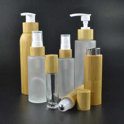 China Cosmetic packaging empty 30ml 50ml 100ml 120ml 150ml frosted glass bottle with bamboo cap for sale