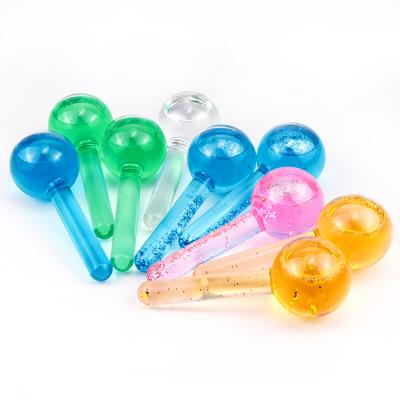 China Blood Vessels Removal Colorful Beauty Facial Crystal Glass Liquid Ball Ice Cooling Globes For Lifting And Tightening Skin for sale