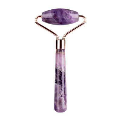 China Natural Handmade Quartz Jade Roller For Face Jade Roller Mini Rose Crystal Face Lift Massager for sale