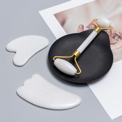 China Comfortable White Jade Stone Heart Facial Natural Opal Gua Sha Feather Shaped Salon Massage for sale