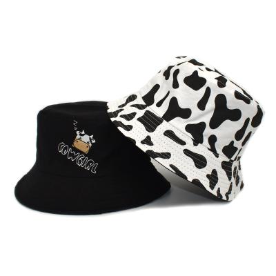 China New Print 2808 Reversible Bucket Hat Cow And Embroidery Double Sided Crossed Out Fisherman Hat for sale