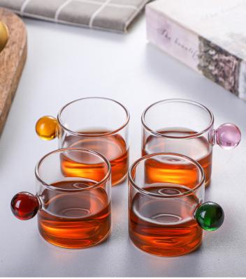 China Six-color Viable Simple Glass Household INS Mug High Borosilicate Glass Ball Handle Cup Small Capacity Simple Coffee Mug for sale