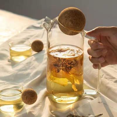 China High Borosilicate Glass Viable Transparent Flower Teapot Jug Glass Teapot With Round Cork Ball Lid for sale