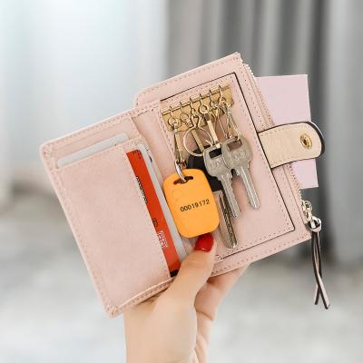 China Genuine Leather Women's Fashion Wallet Women Key Chain Covers Zipper Case Bag Men Main Holder Locks Organizer Wallet for sale