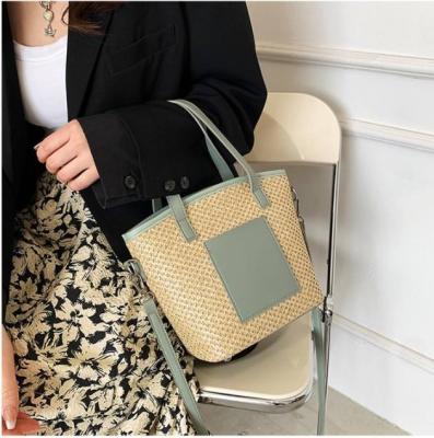 China 2022 Summer Other Bag For Women New Fashion Single Shoulder Cross - Body Bag Large Capacity Straw Woven Bucket Zipper Ladies Bag for sale