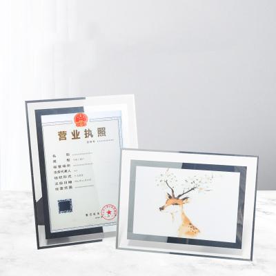 China Custom Creative Hot Selling A4 Your Brand Logo Wedding Decoration Metal Crystal Glass Photo Frames for sale