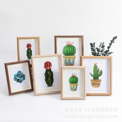 China Creative Wooden Hollow Photo Frame Set 6 7 8 Inch Creative Handmade Diy Specimen Photo Frame for sale