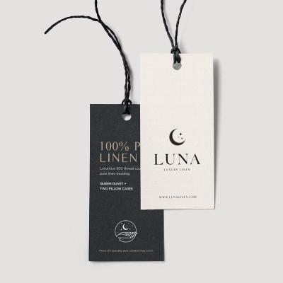 China Sustainable Custom Printed Swing Tags Luxury Cardboard Special Shape Hang Tags Label For Apparel Garment for sale