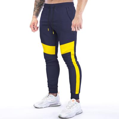 China Fitness Anti-static Casual Sports Pants Men's Slim Fashion Foot Sports Pants Small for sale