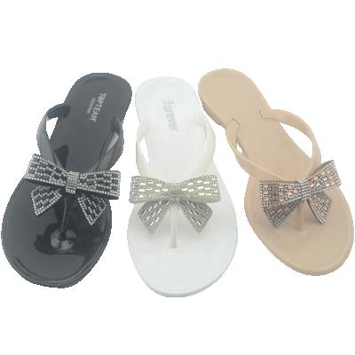 China CUSHIONING FASHION PLASTIC WOMEN Thong JELLY FLAT SLIPPER WITH BOWKNOT for sale