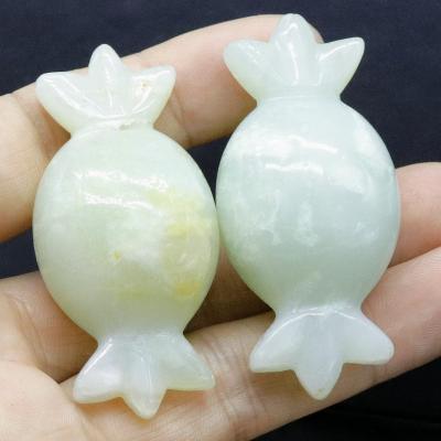 China China Crystal Carving Wholesale Hand Carved Amazon Natural Stone Candy Healing Crystals For Home Decoration for sale