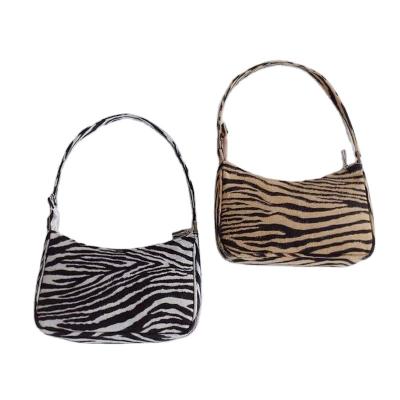 China Newest Chic Zebra-copy Armpit Fluffy Bags For Ladies Autumn Winter Cool Fashion Women Chic Shoulder Bag For Girls for sale